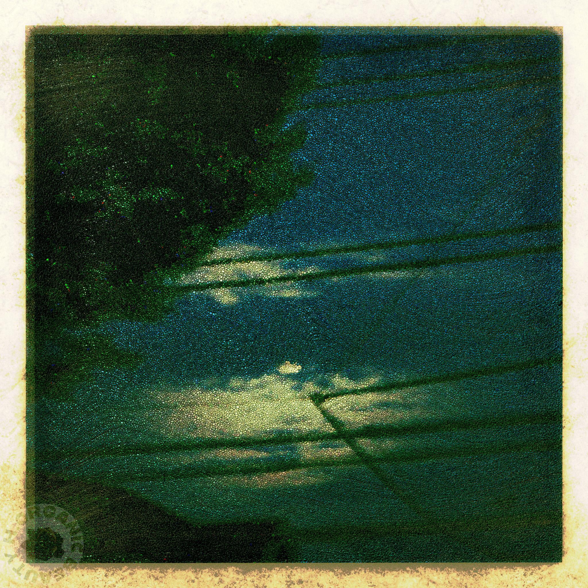 A faintly visible hazy moon